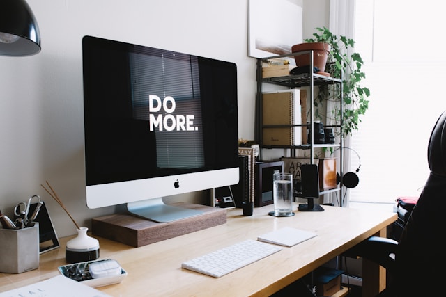 Maine business owner celebrating increased revenue and online growth through professional web design services that drive customer acquisition and sales